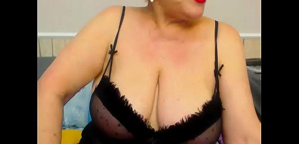  Granny shows off her huge tits